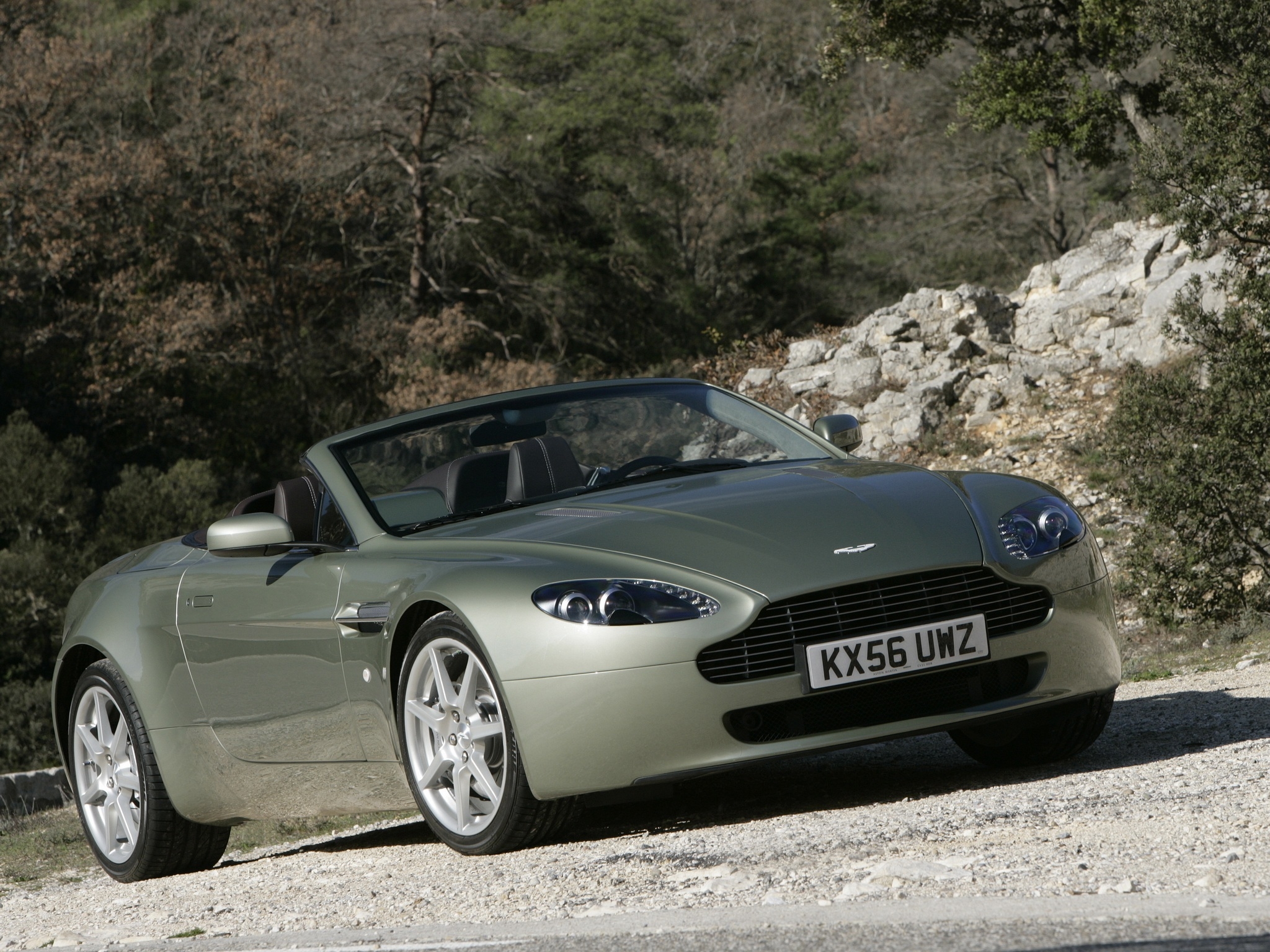 56782 download wallpaper aston martin, cars, forest, side view, style, cabriolet, v8, vantage, 2006, beige screensavers and pictures for free
