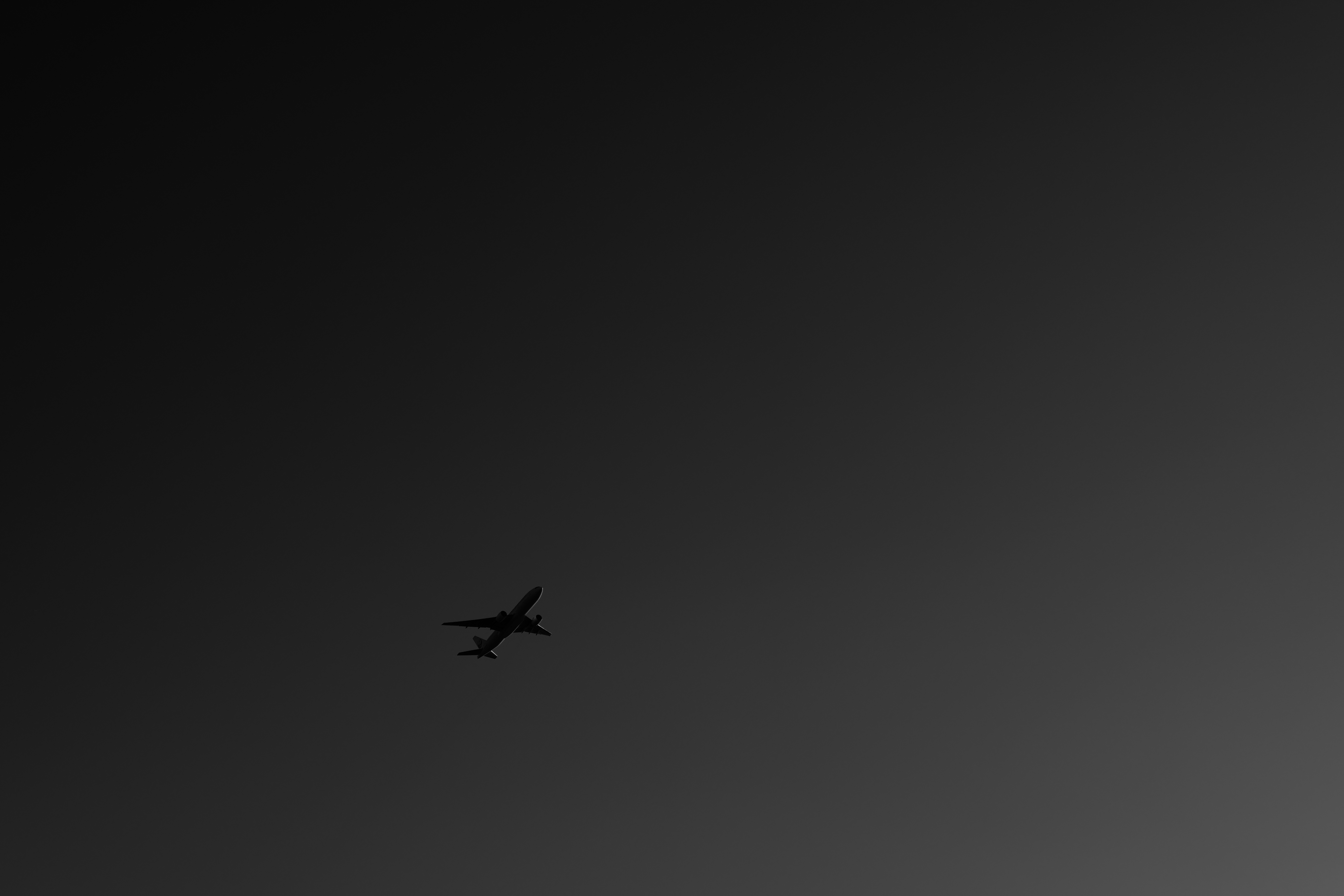 Mobile wallpaper plane, sky, dark, minimalism, flight, bw, chb, airplane