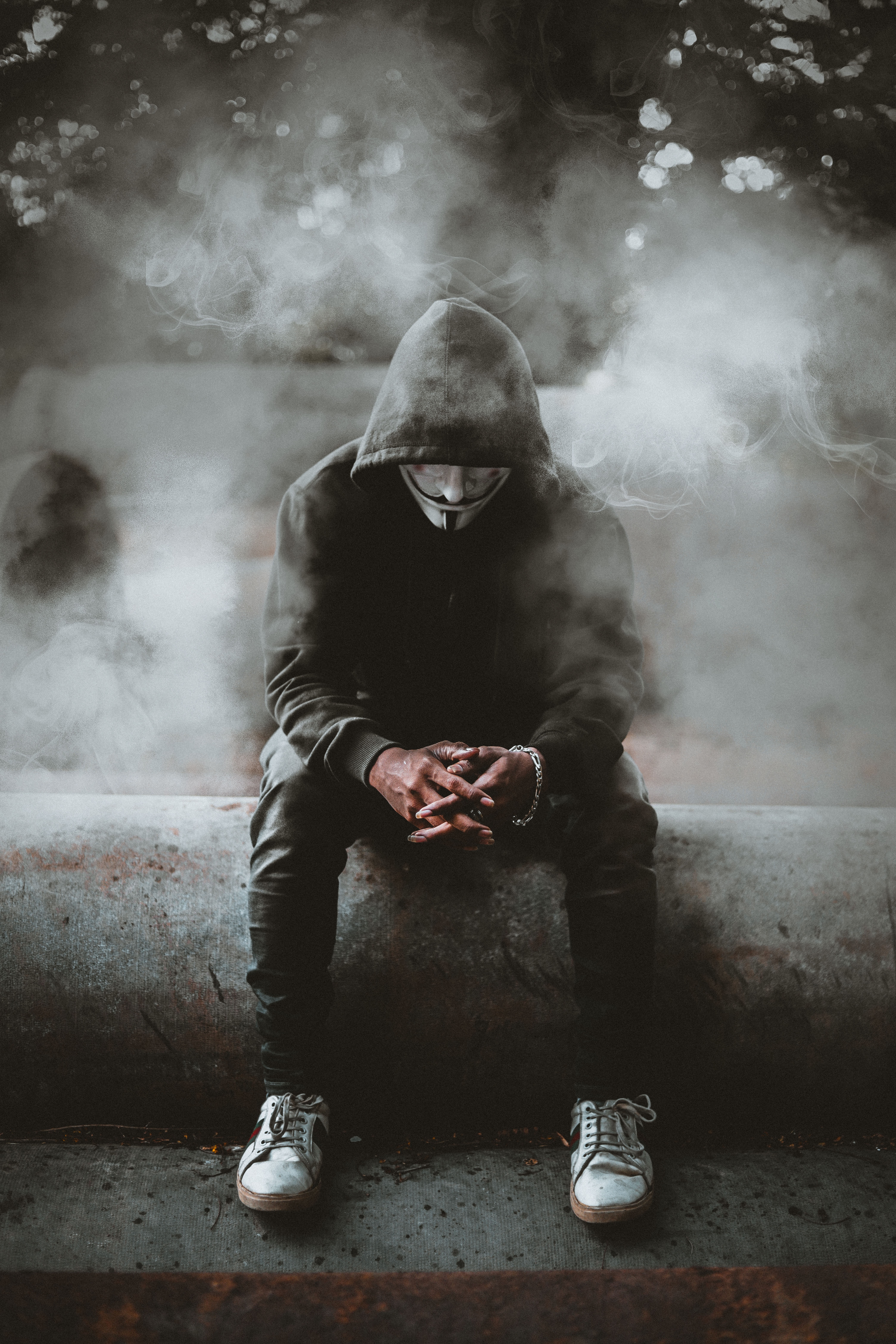 145718 Screensavers and Wallpapers Hood for phone. Download hood, anonymous, smoke, miscellanea, miscellaneous, mask, human, person pictures for free