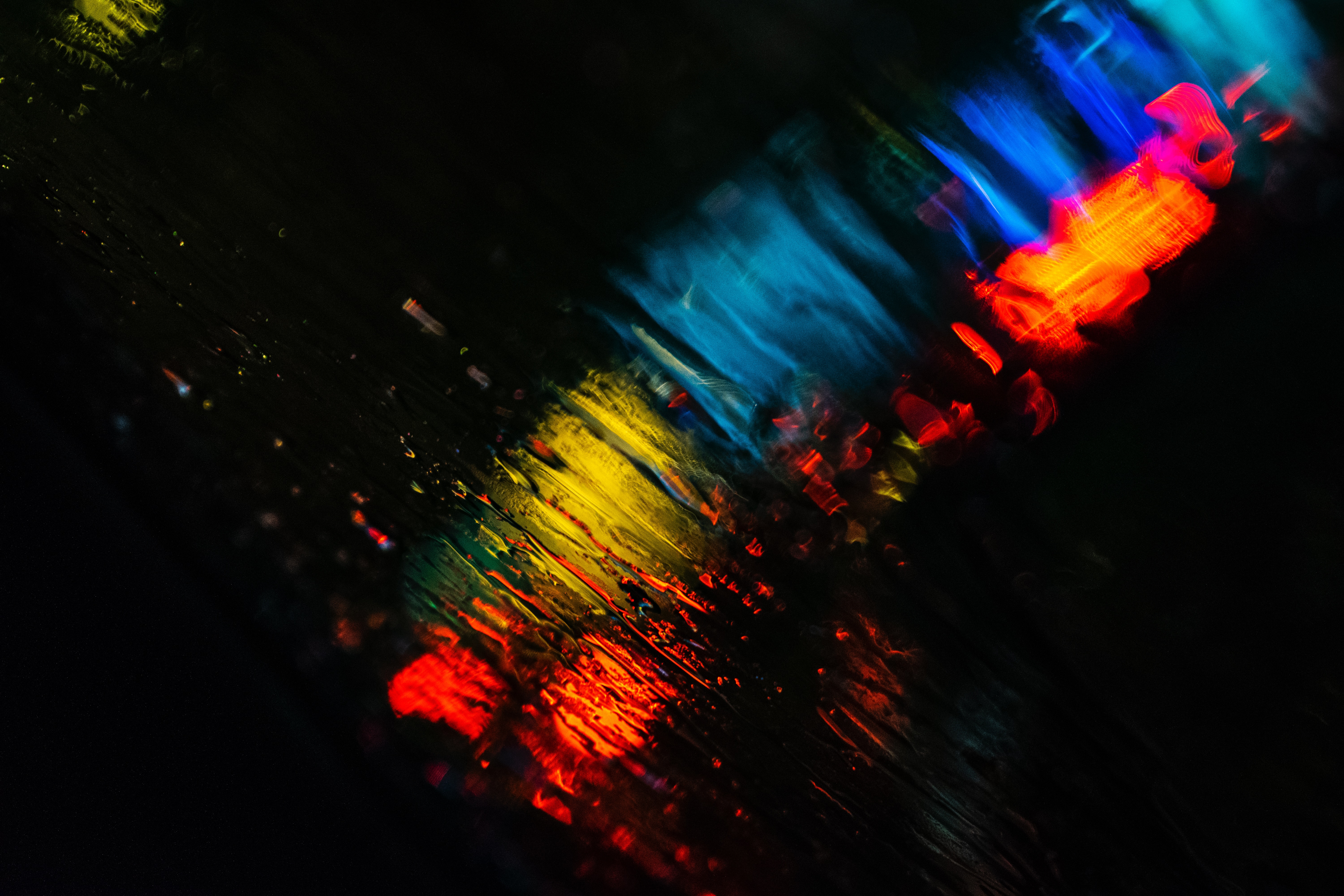 105166 download wallpaper glass, rain, lights, macro, blur, smooth screensavers and pictures for free
