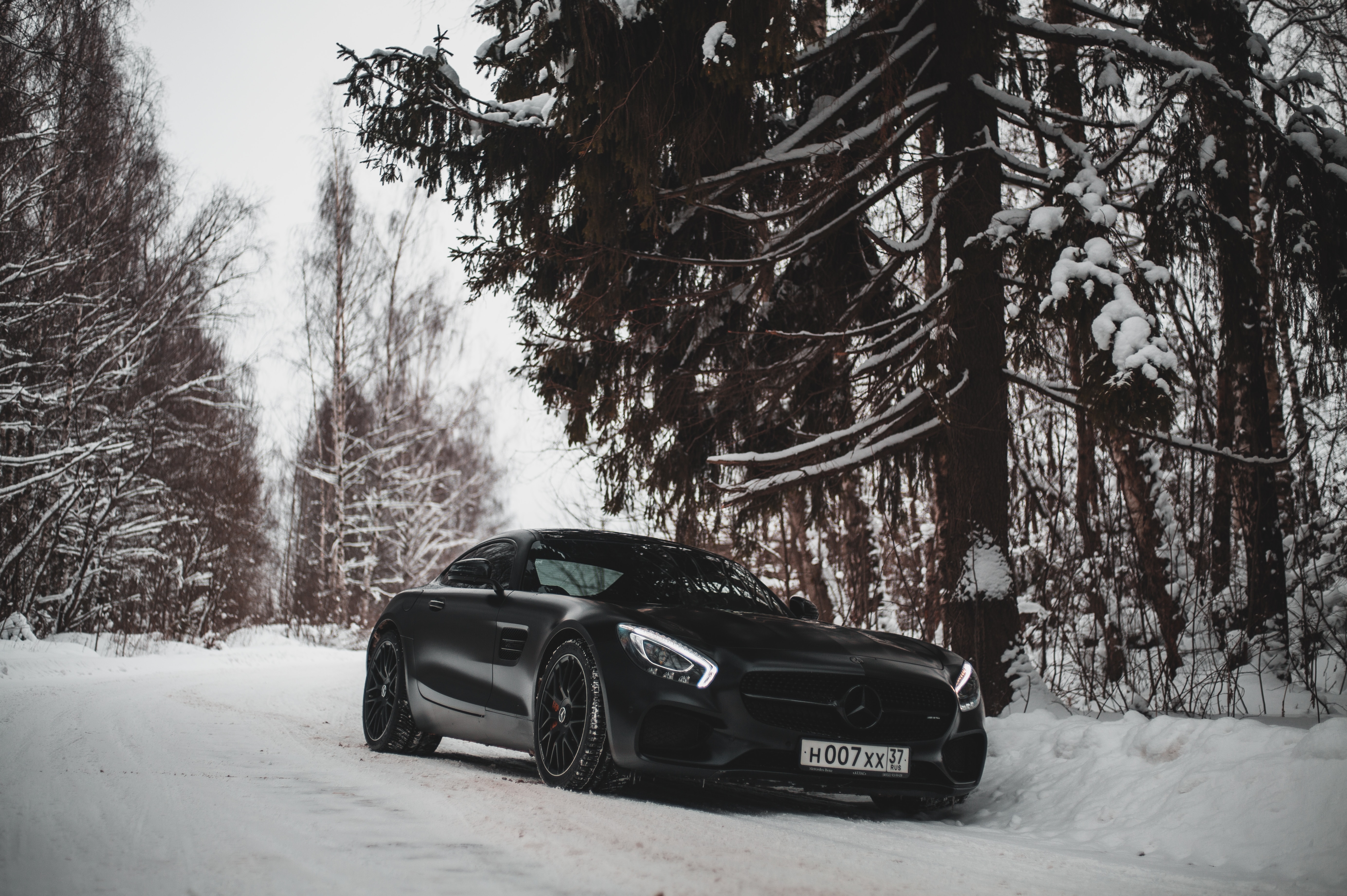 71605 download wallpaper sports, snow, cars, black, forest, car, machine, sports car, mercedes-benz screensavers and pictures for free