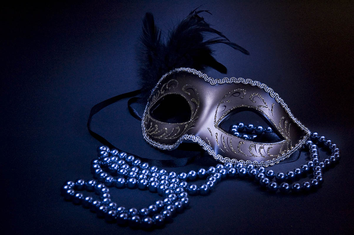 objects, masks, blue phone background