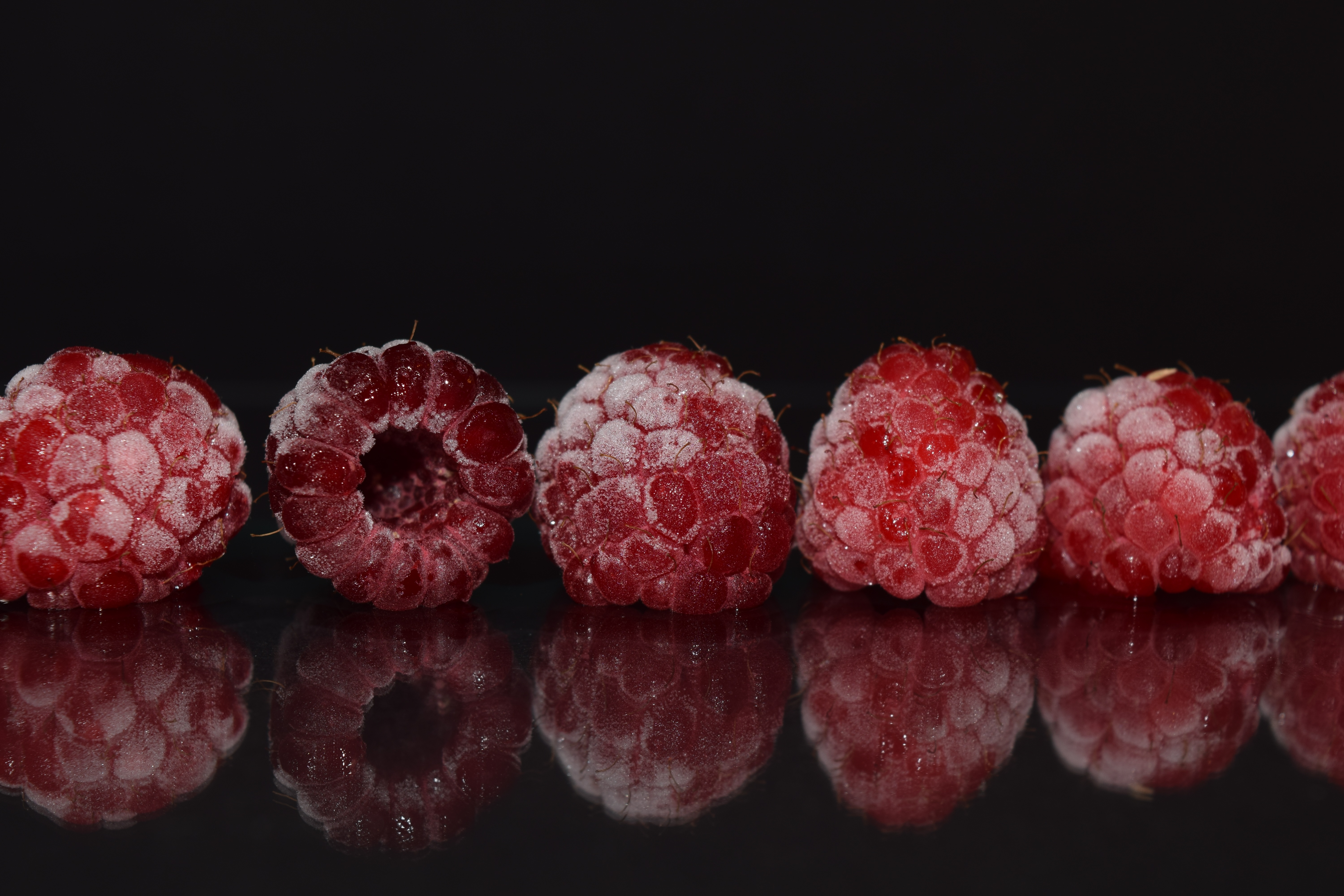131848 download wallpaper food, raspberry, berries, reflection, frozen screensavers and pictures for free