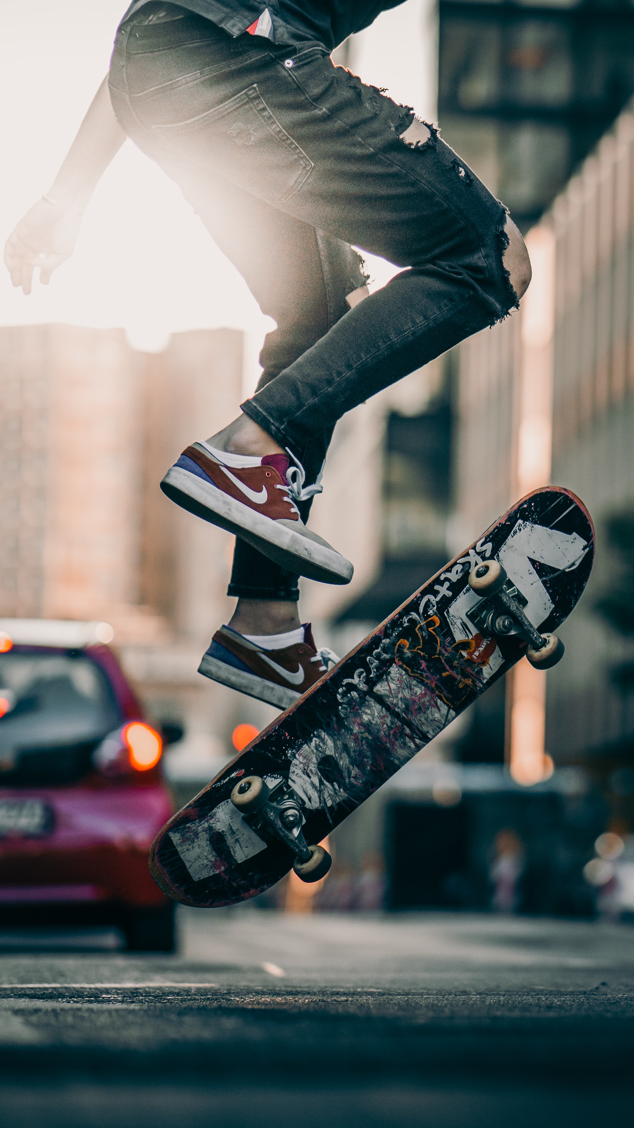 Wallpaper for mobile devices beams, street, sneakers, legs
