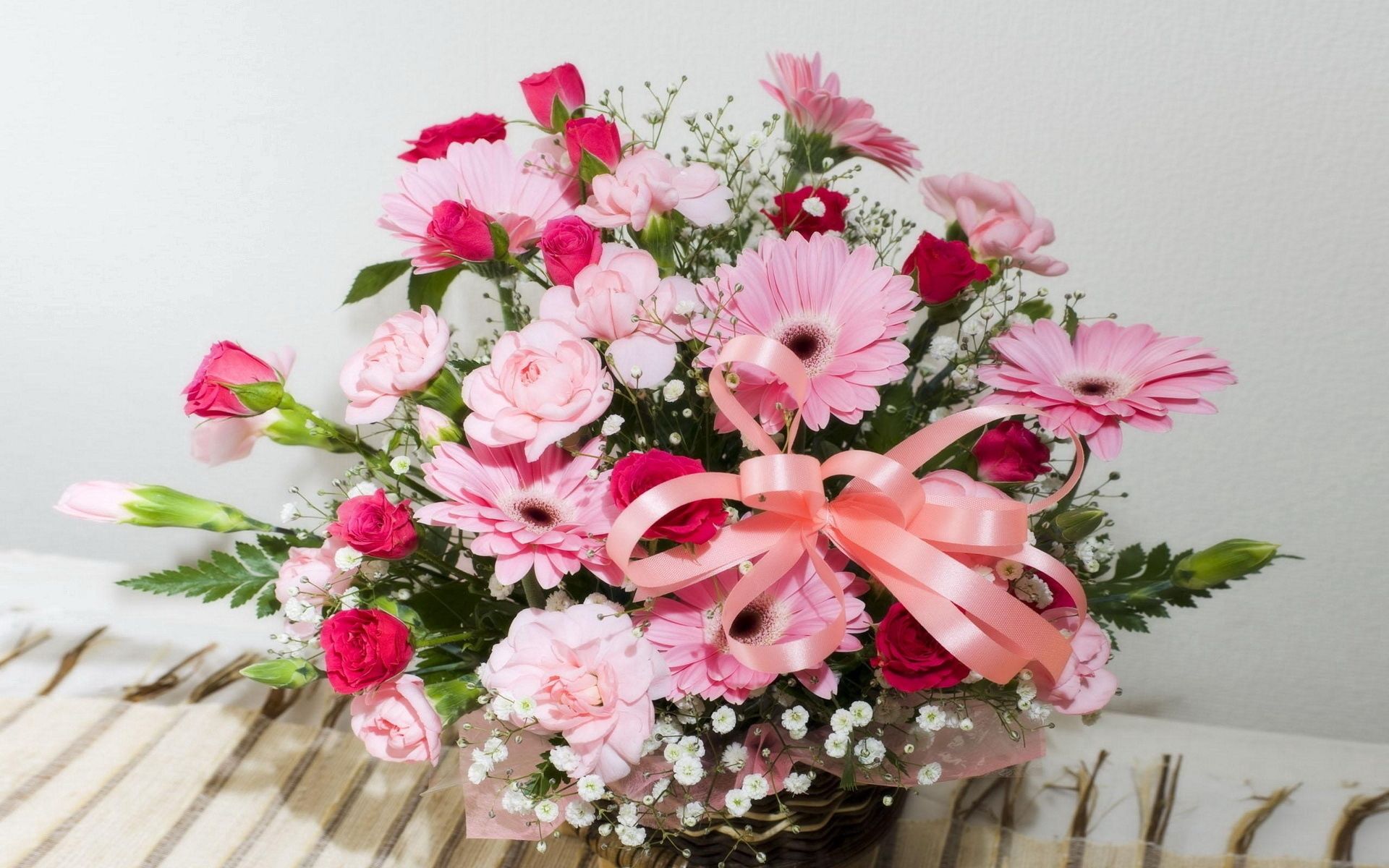 136687 download wallpaper gerberas, flowers, roses, greens, tape, basket screensavers and pictures for free