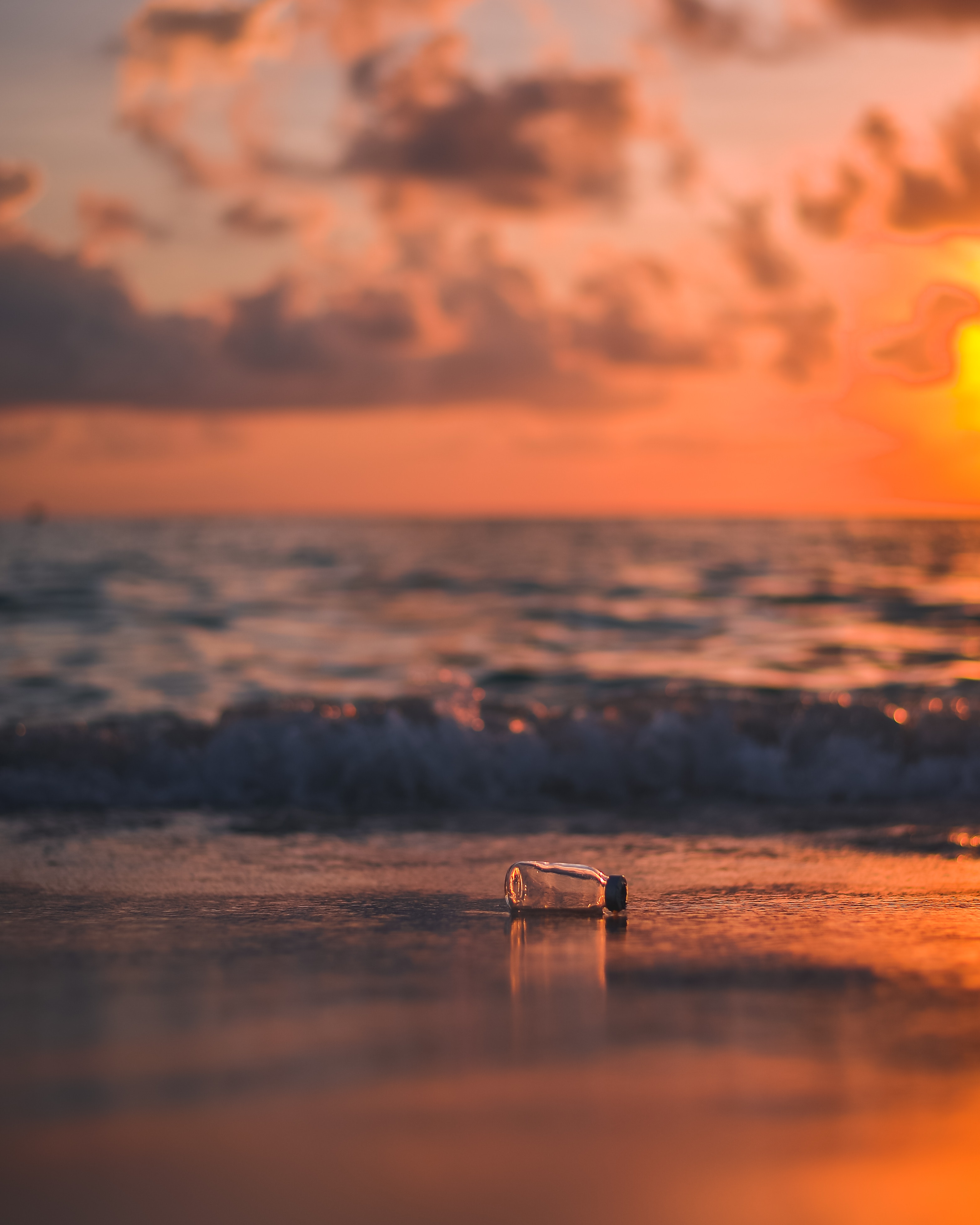 bottle, shore, sea, bank, glass, smooth, sunset, nature, blur 4K Ultra
