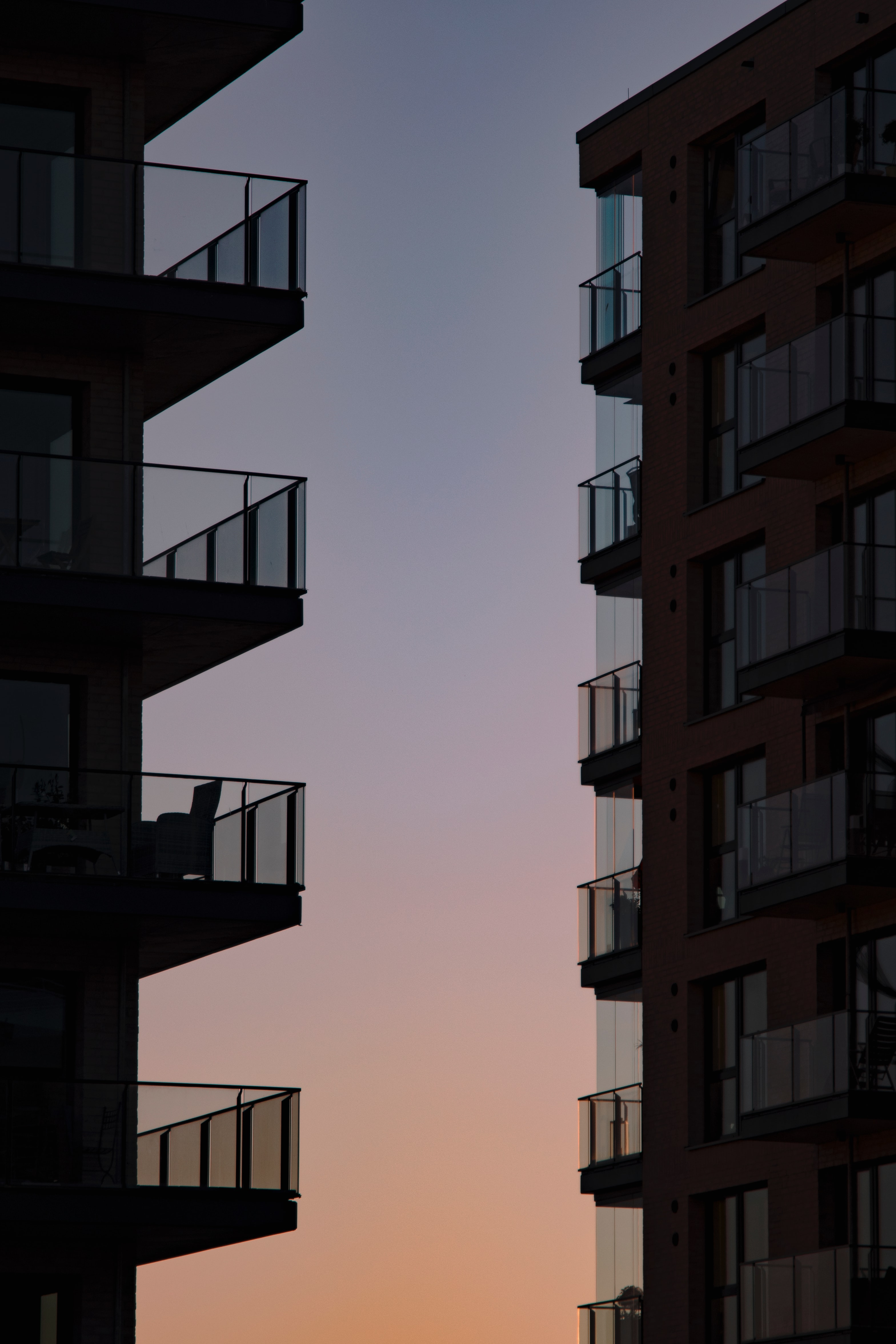 Widescreen image balconies, cities, sunset, sky
