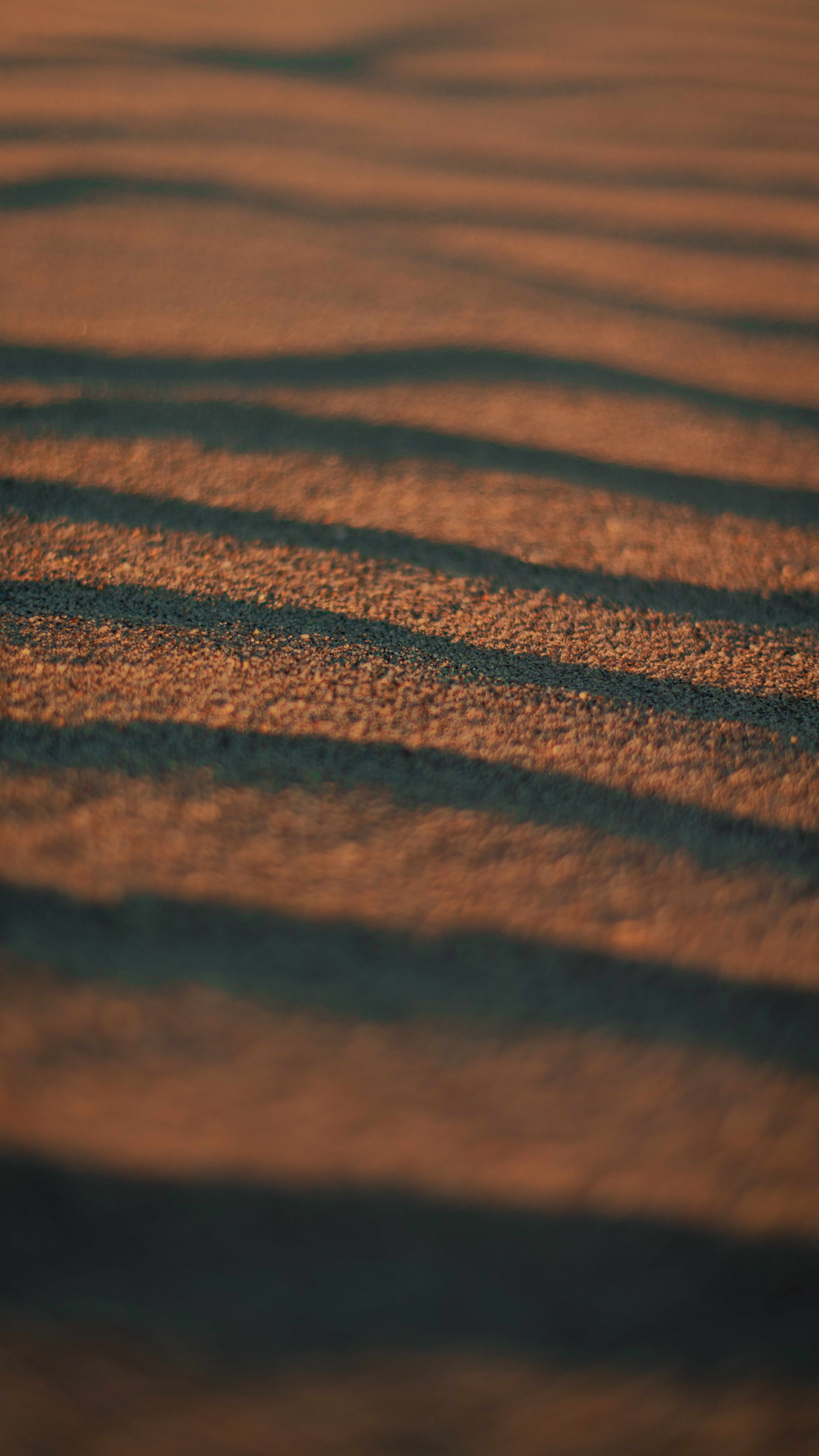 122660 download wallpaper waves, sand, macro, brown, surface screensavers and pictures for free