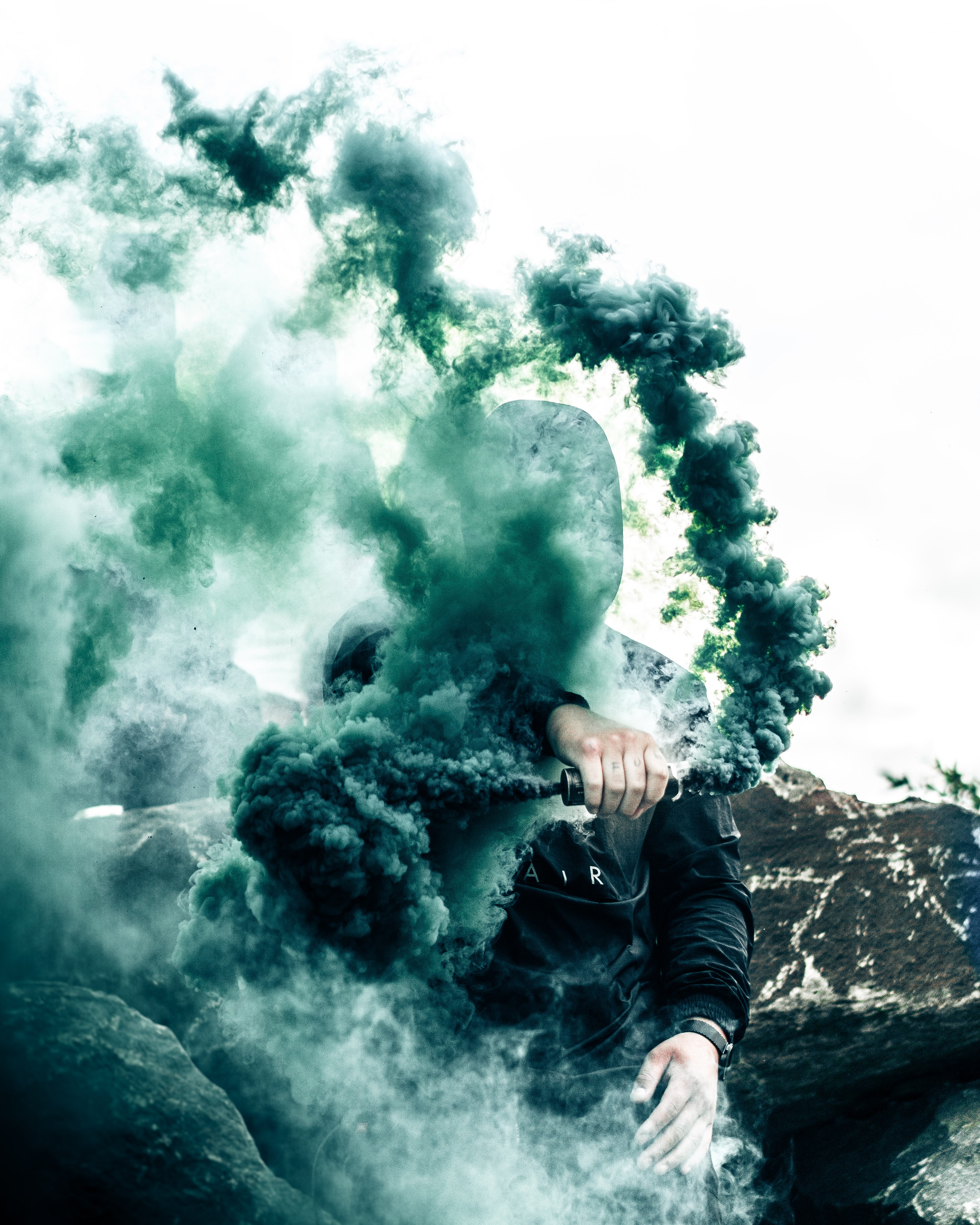 128832 Screensavers and Wallpapers Person for phone. Download person, hood, smoke, green, miscellanea, miscellaneous, human pictures for free