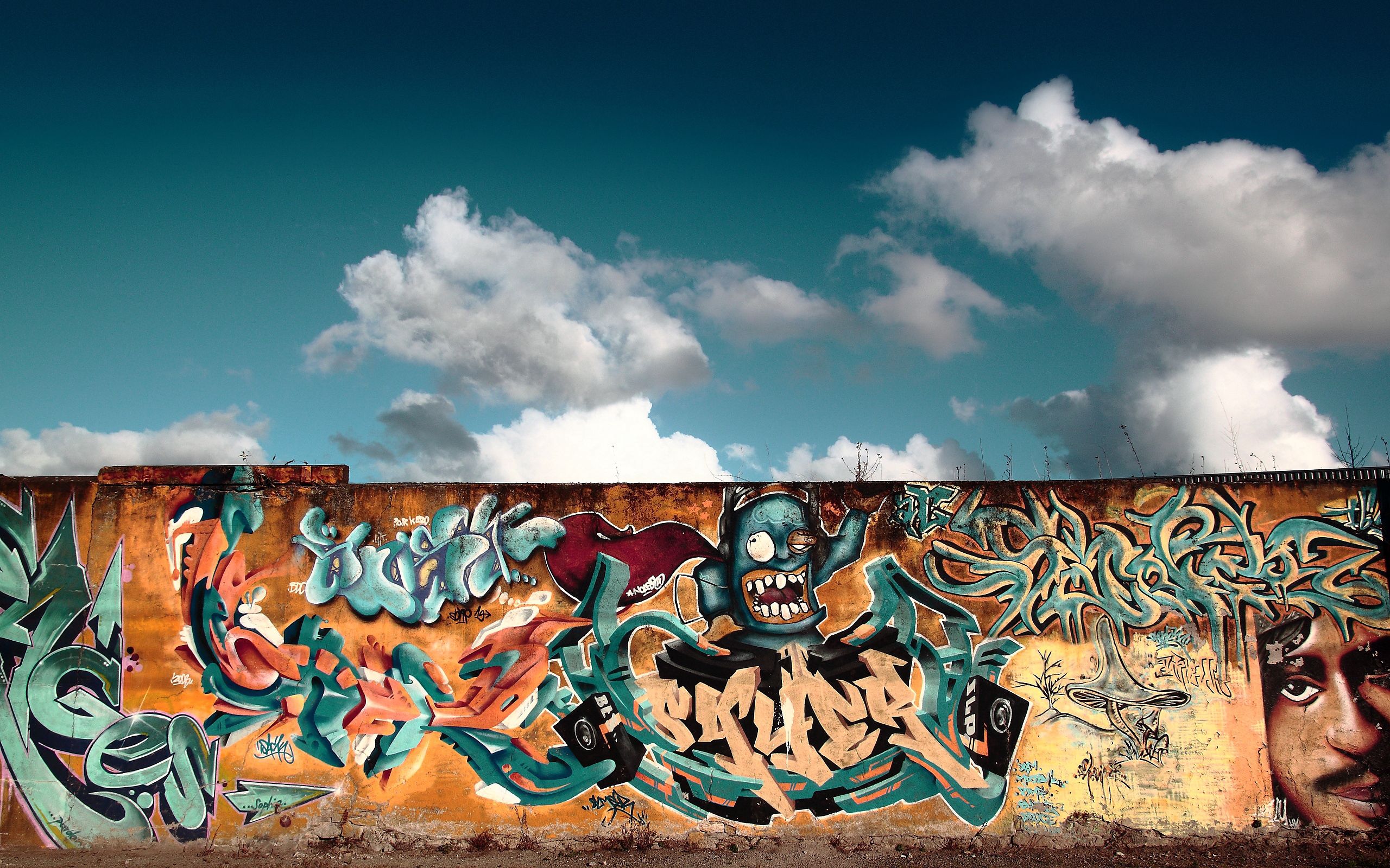 QHD wallpaper clouds, cities, colourful, wall