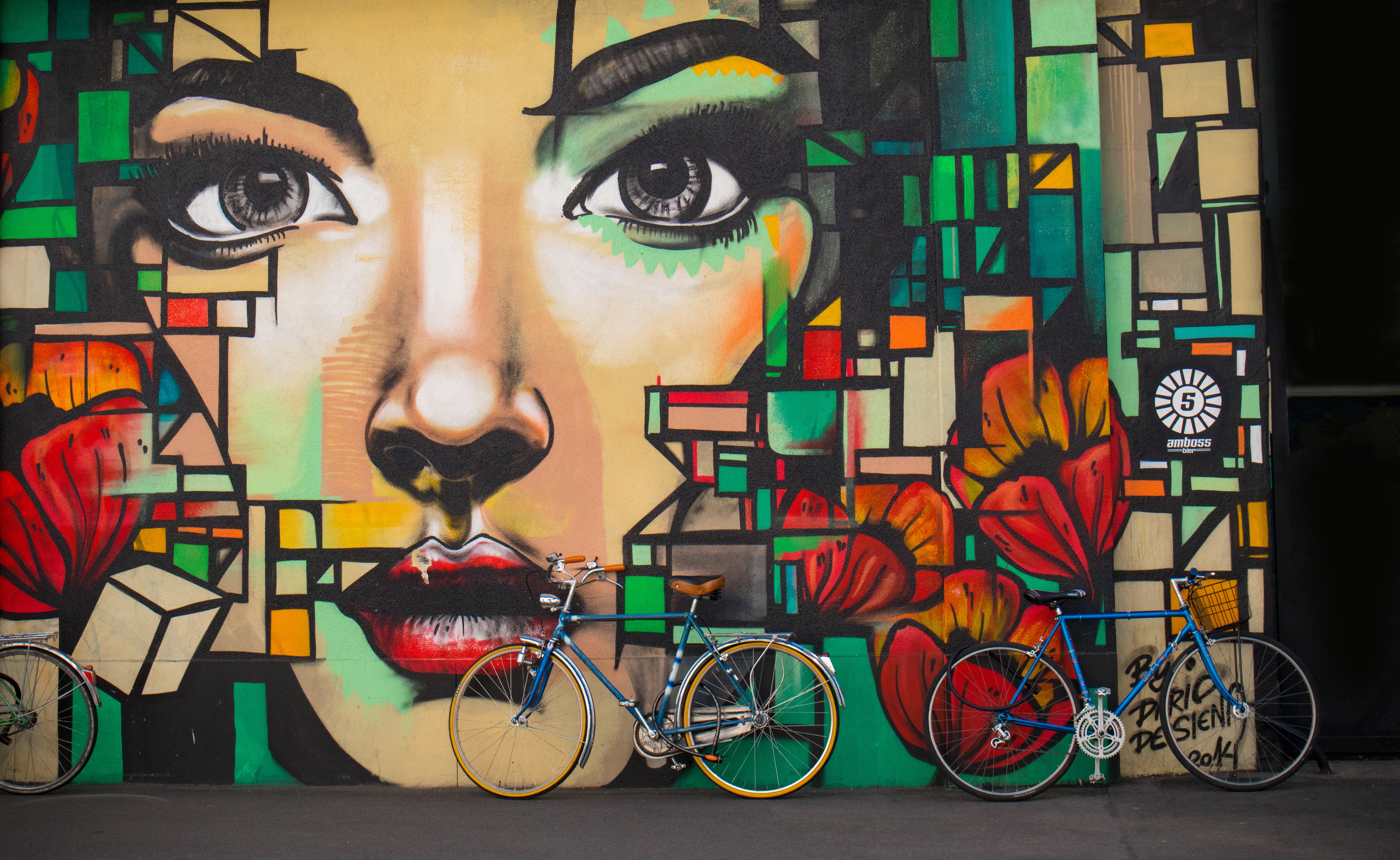face, bicycles, wall, art Horizontal Wallpapers
