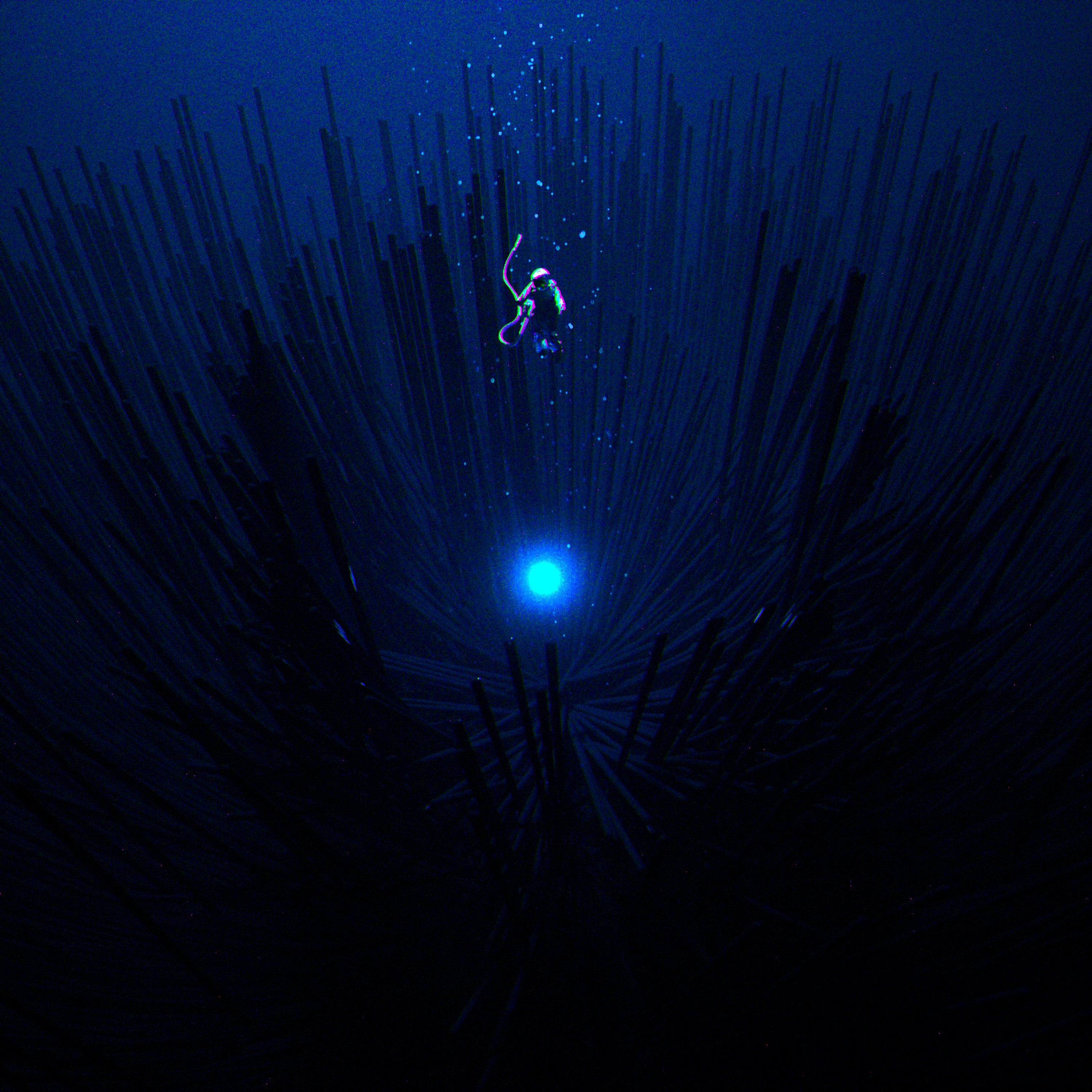 iPhone background shine, brilliance, scuba diver, space