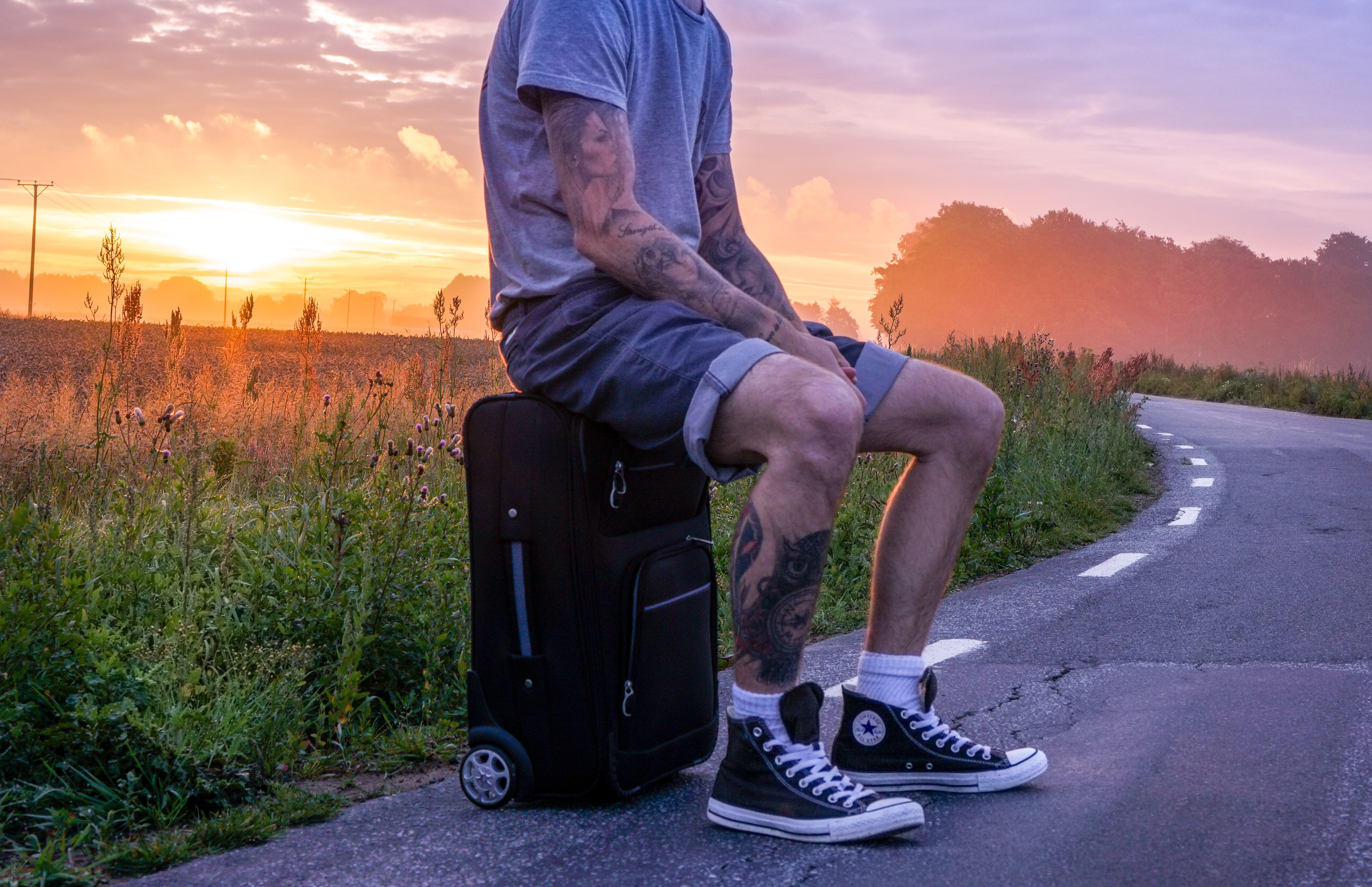 129784 Screensavers and Wallpapers Man for phone. Download sunset, miscellanea, miscellaneous, man, tattoo, tattoos, suitcase pictures for free