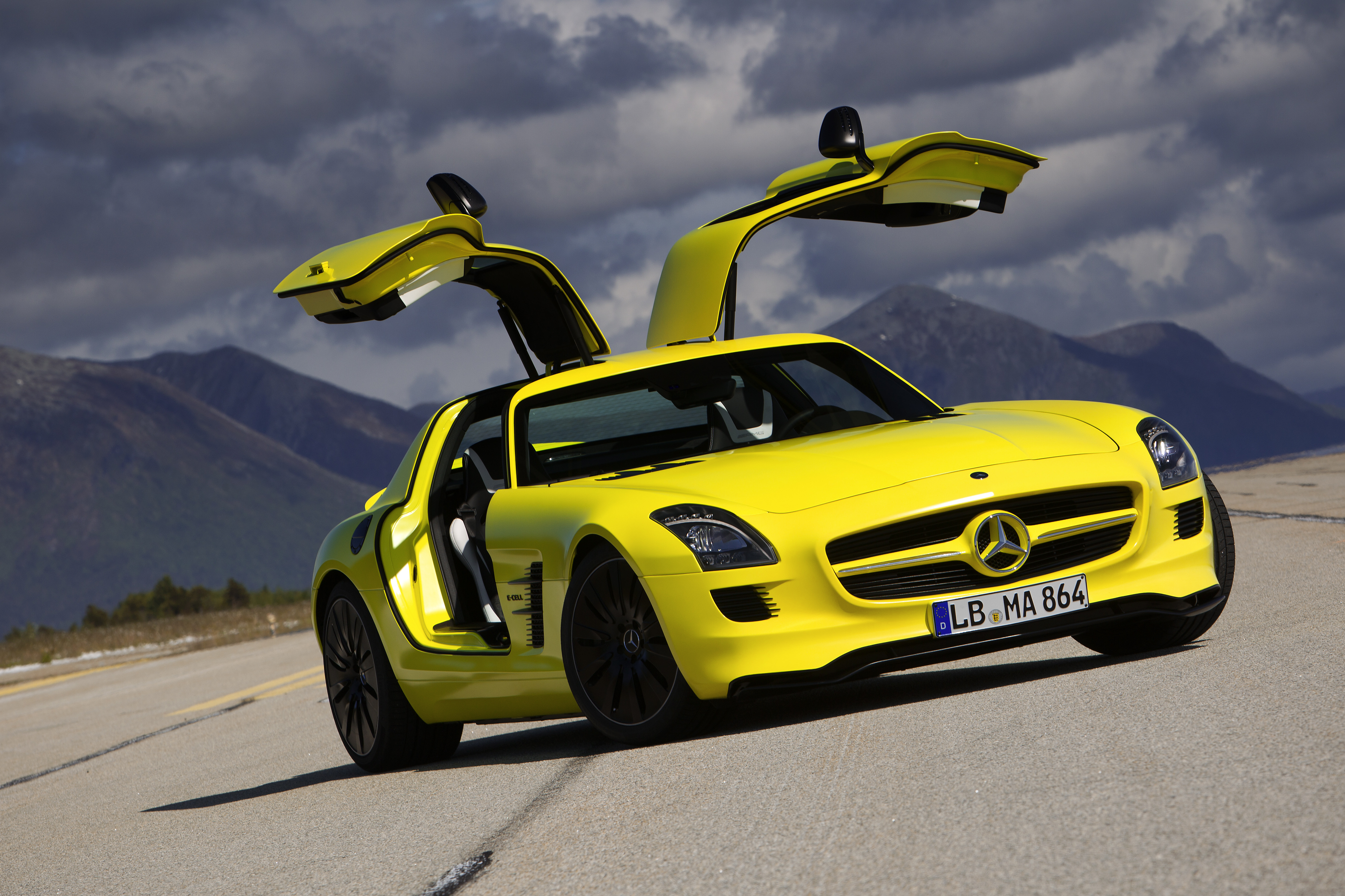 116140 download wallpaper cars, yellow, amg, mercedes-benz, coupe, sls, e-cell screensavers and pictures for free
