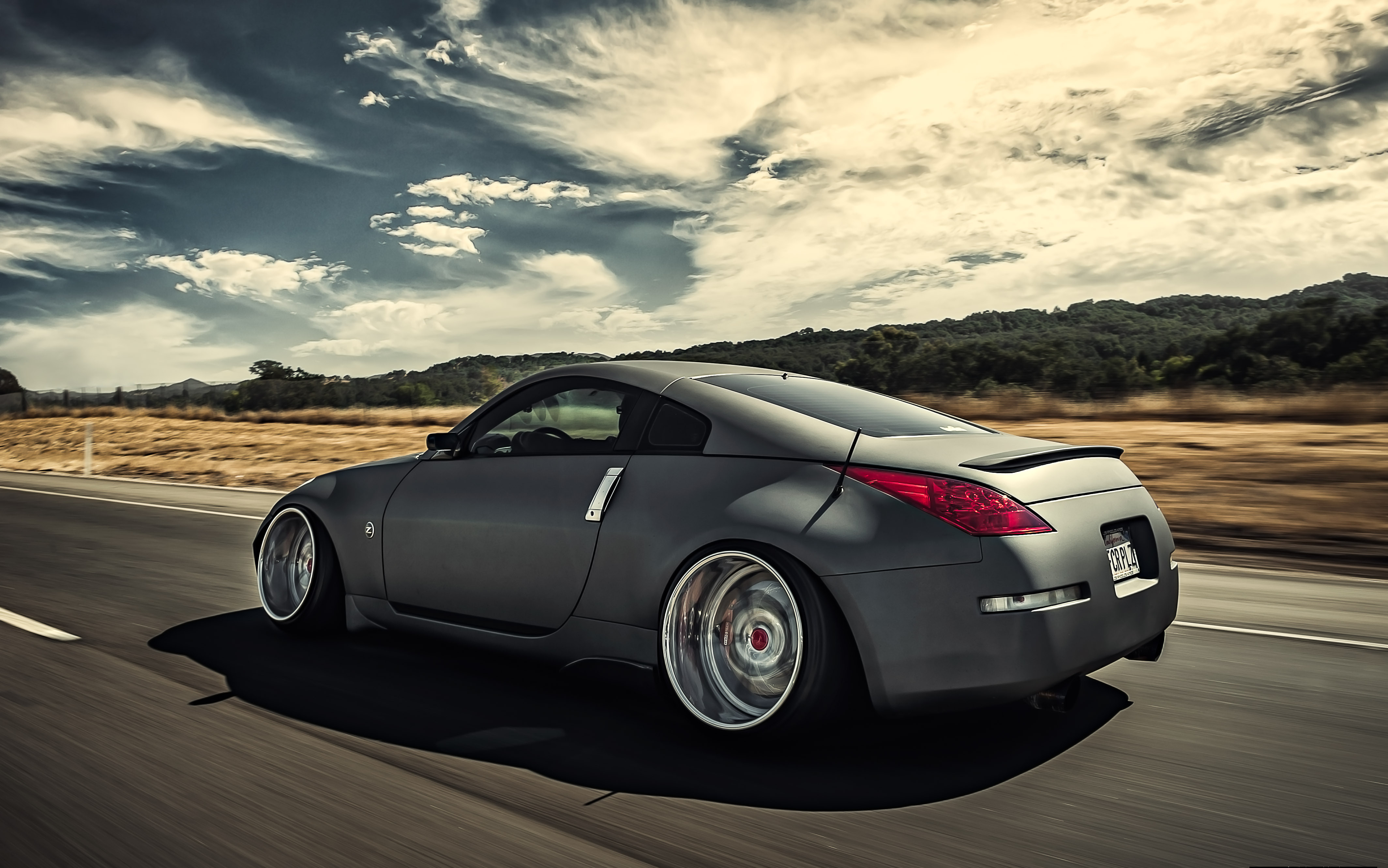 Mobile wallpaper cars, nissan, traffic, movement, side view, speed, stance, 350z